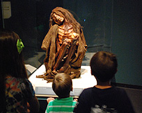 Children Viewing mummy Exhibit Mummies of the World photo